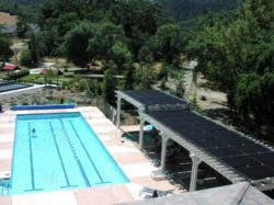Photo Courtesy of Bill Stewart, SolarCraft/FAFCO. Installation on Clover Springs Community Association Pool in Cloverdale, Calif.
